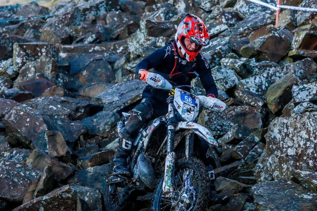 RAW Enduro rider navigating rocky terrain